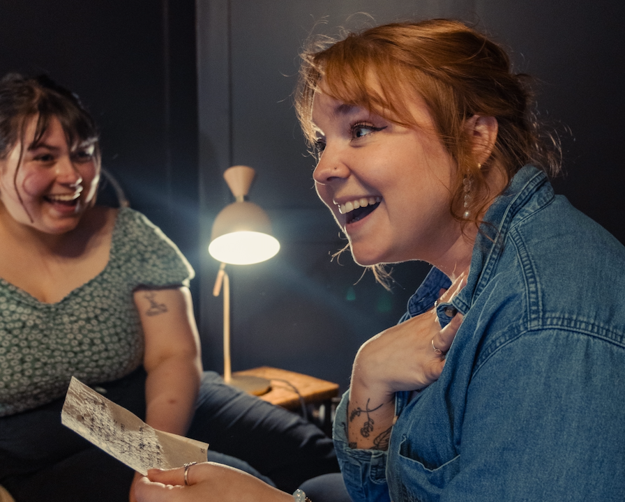 client reacting happily to custom poem
